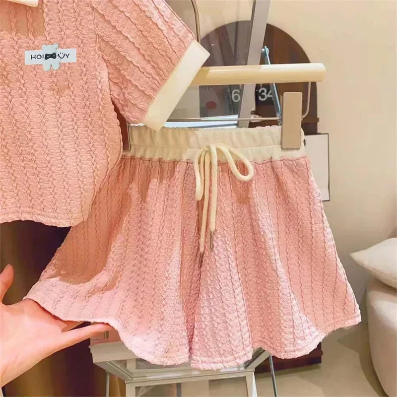 Conjunto Infantil Feminino Rosa com Blusa Polo e Saia – Estilo e Delicadeza para as Pequenas