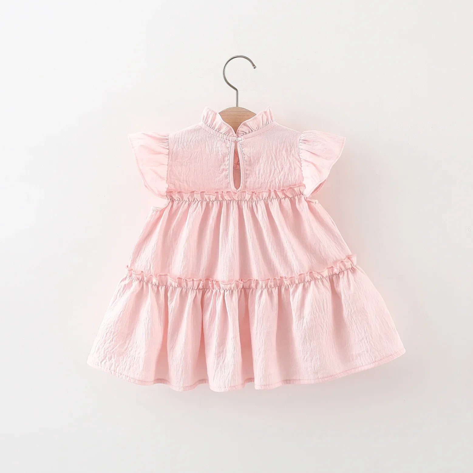Vestido Infantil Feminino Rosa com Laço Verde – Delicadeza e Charme para Todas as Ocasiões