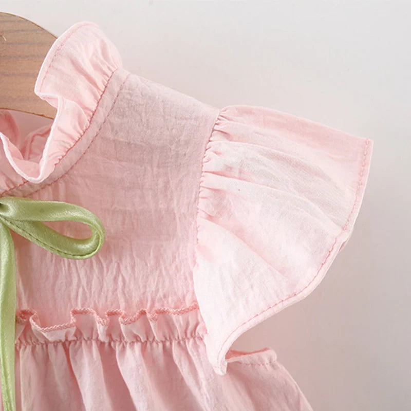Vestido Infantil Feminino Rosa com Laço Verde – Delicadeza e Charme para Todas as Ocasiões