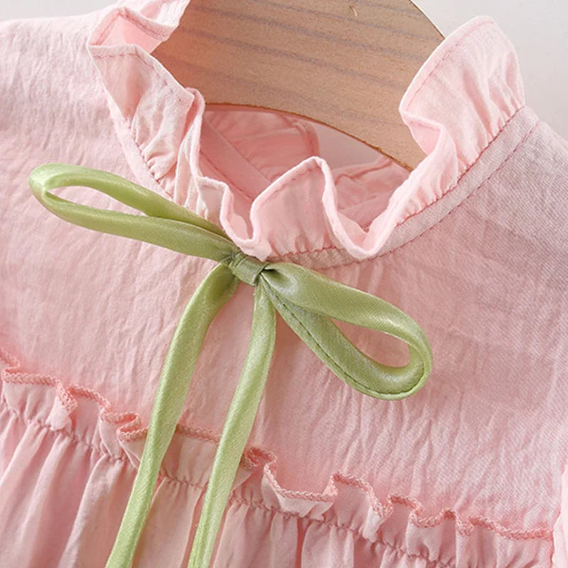 Vestido Infantil Feminino Rosa com Laço Verde – Delicadeza e Charme para Todas as Ocasiões