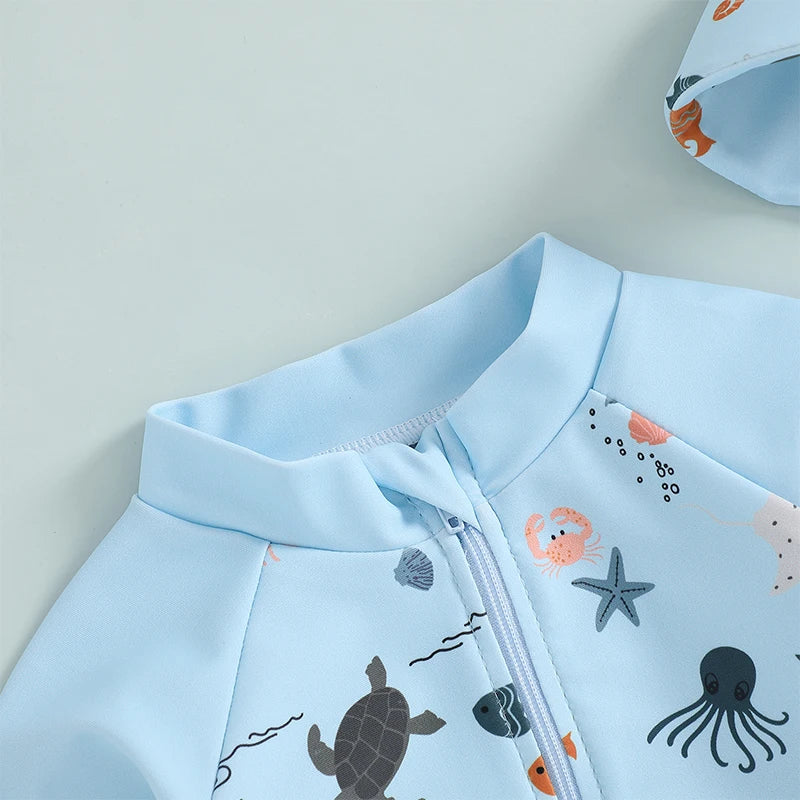 Maiô Infantil Manga Longa com Estampa Marinha + Chapéu – Para Bebês e Meninos de 0 a 3 Anos | Proteção Solar e Zíper Frontal