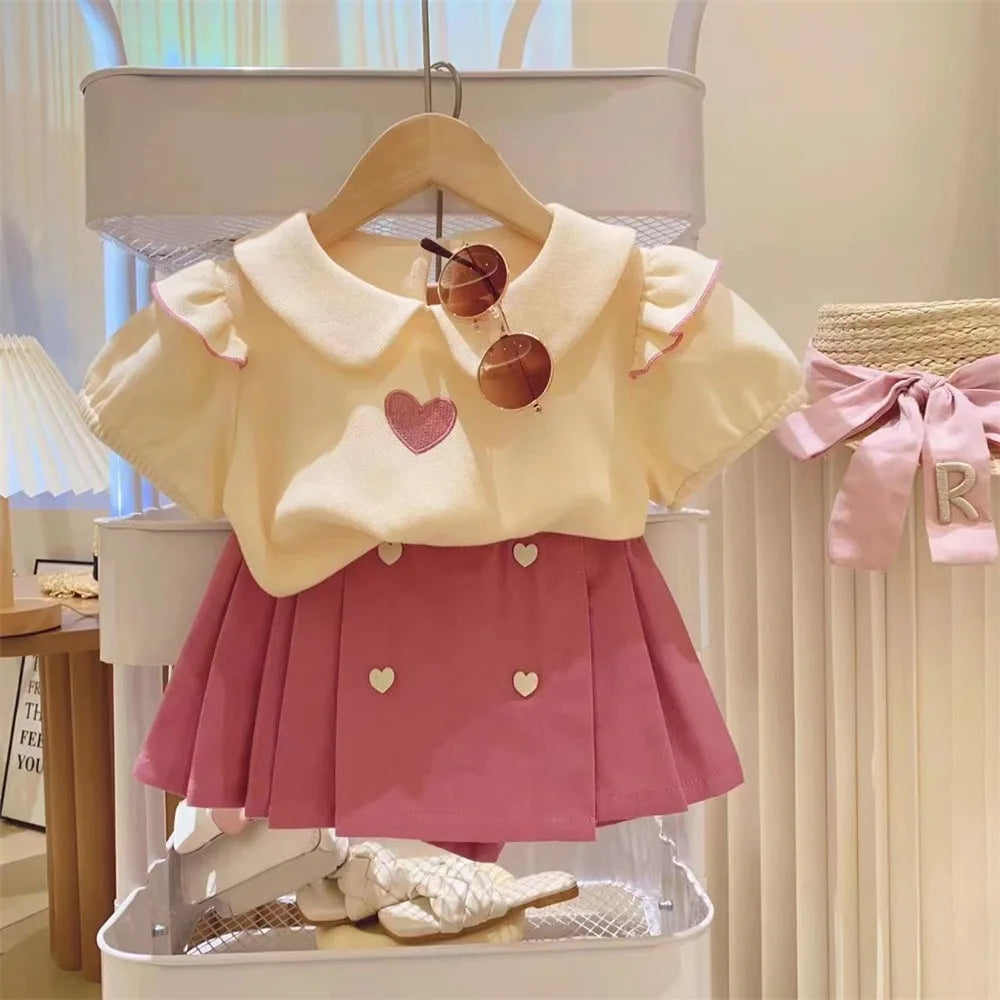 Conjunto Infantil Feminino Blusa Amarela e Saia Rosa com Corações – Charme e Delicadeza para as Pequenas