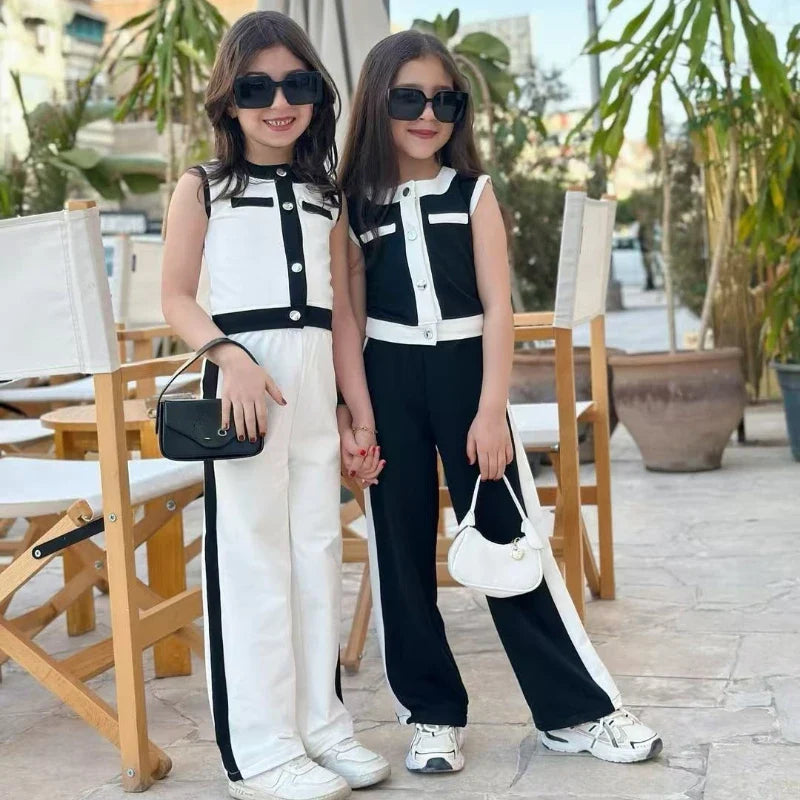 Macacão Infantil Feminino Fashion Preto e Branco – Estilo Moderno para Pequenas Cheias de Atitude