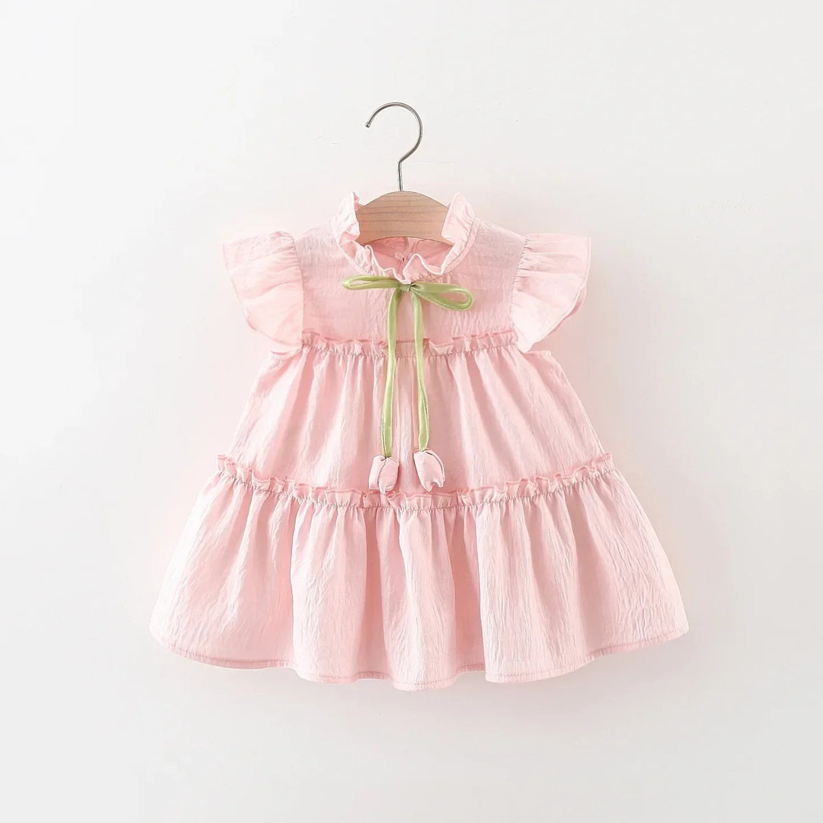 Vestido Infantil Feminino Rosa com Laço Verde – Delicadeza e Charme para Todas as Ocasiões