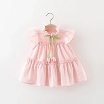 Vestido Infantil Feminino Rosa com Laço Verde – Delicadeza e Charme para Todas as Ocasiões