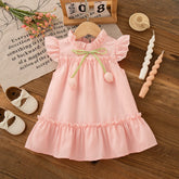 Vestido Infantil Feminino Rosa com Laço Verde e Babado – Charme e Delicadeza para Todas as Ocasiões