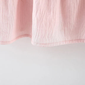 Vestido Infantil Feminino Rosa com Laço Verde – Delicadeza e Charme para Todas as Ocasiões