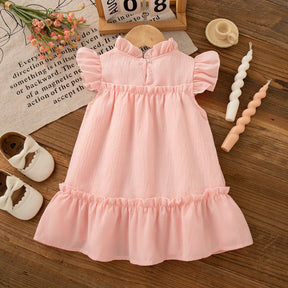 Vestido Infantil Feminino Rosa com Laço Verde e Babado – Charme e Delicadeza para Todas as Ocasiões