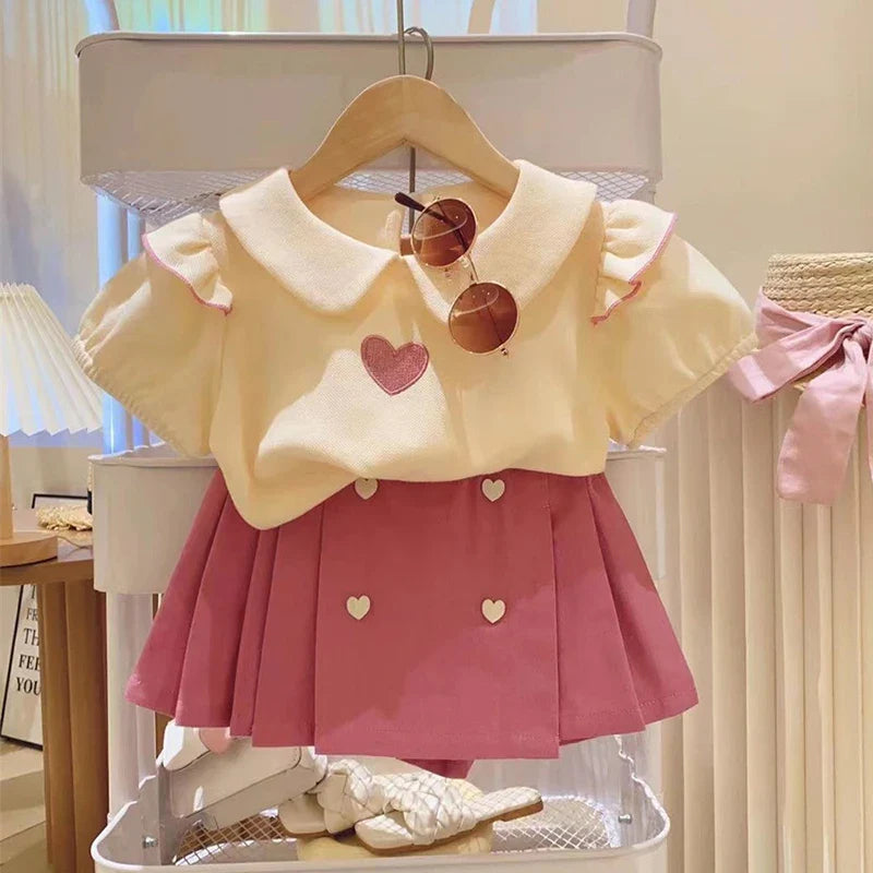 Conjunto Infantil Feminino Blusa Amarela e Saia Rosa com Corações – Charme e Delicadeza para as Pequenas