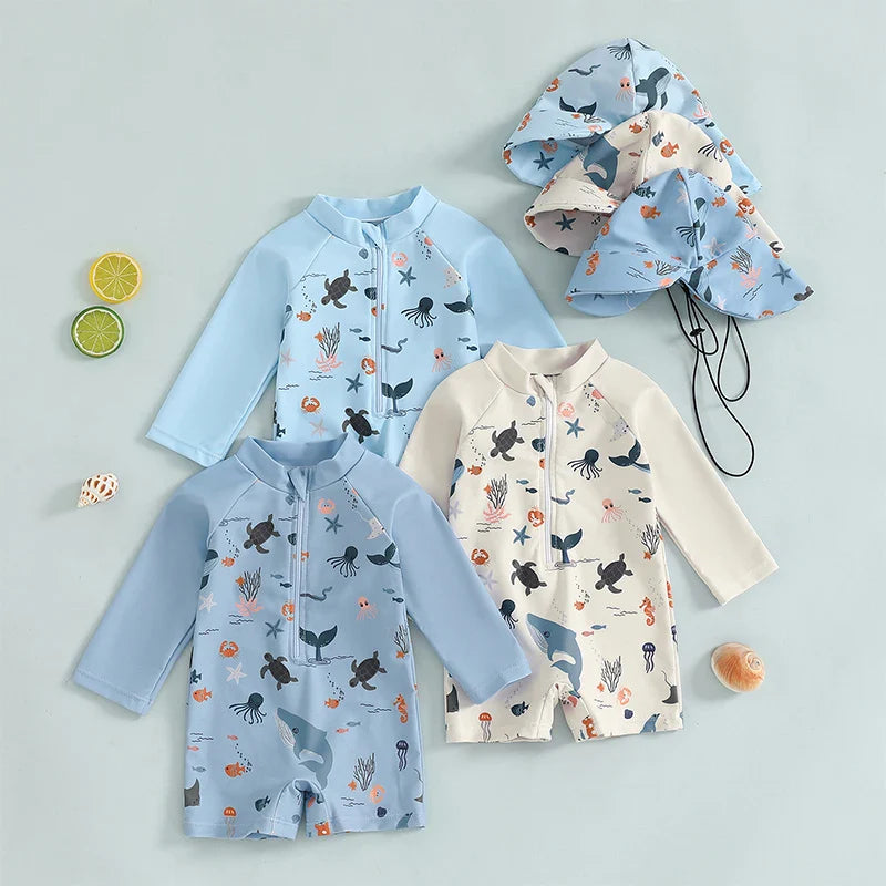 Maiô Infantil Manga Longa com Estampa Marinha + Chapéu – Para Bebês e Meninos de 0 a 3 Anos | Proteção Solar e Zíper Frontal